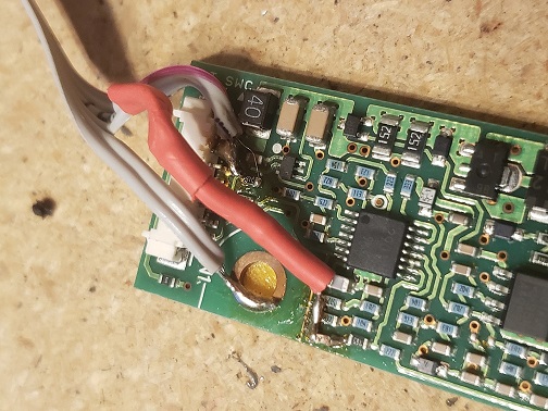 Board with resistor in heat shrink